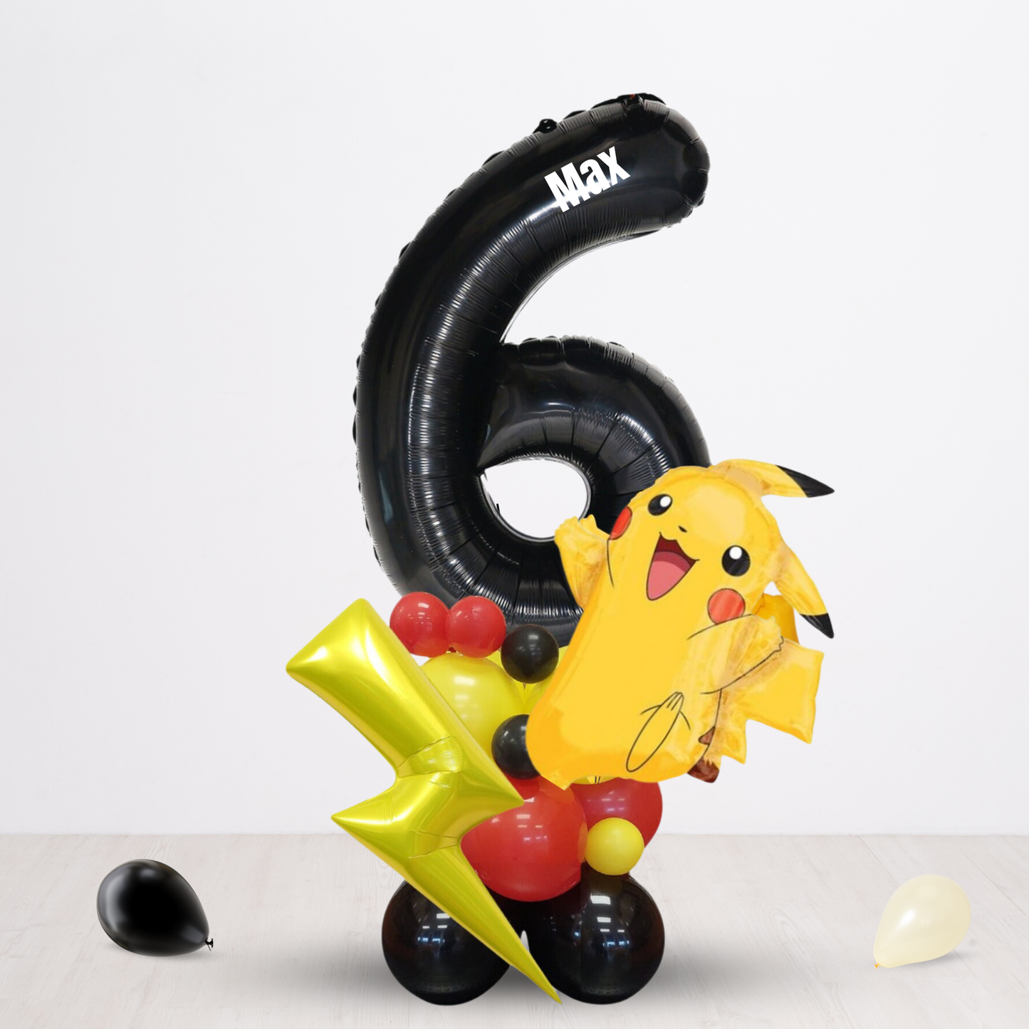 Black red yellow licensed Pokemon boys birthday balloon sculpture bouquet