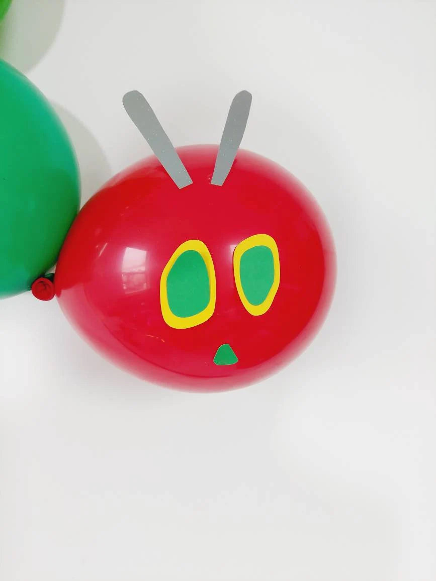 The Hungry Caterpillar and butterfly themed birthday balloon bouquet